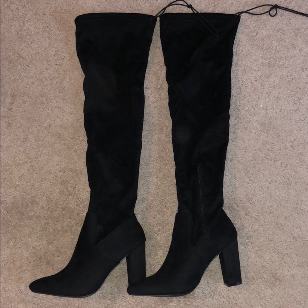 Thigh high black boots